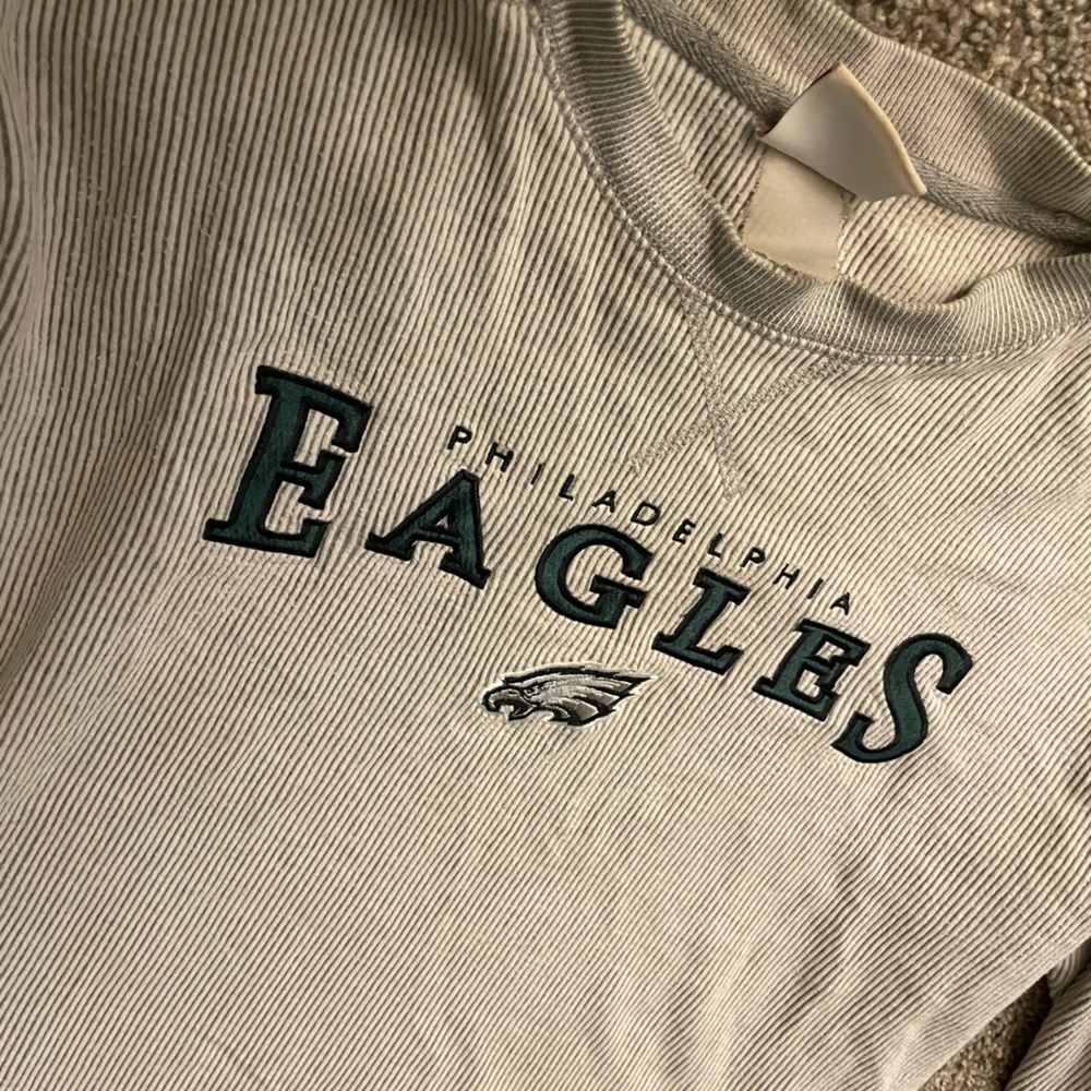 Eagles nfl shirt..has mark on back of one of the sleeves